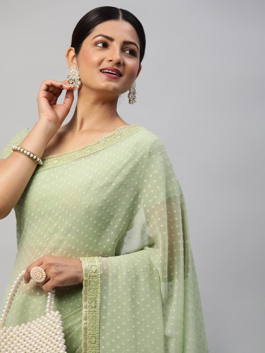Pista Green Georgette Saree With Woven Design Embroidered Work green sarees